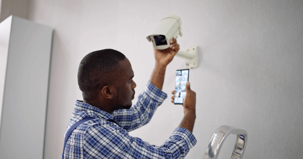 Man installing a camera for senior living monitoring